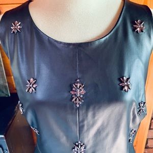 Lane Bryant faux leather top with bead detail.